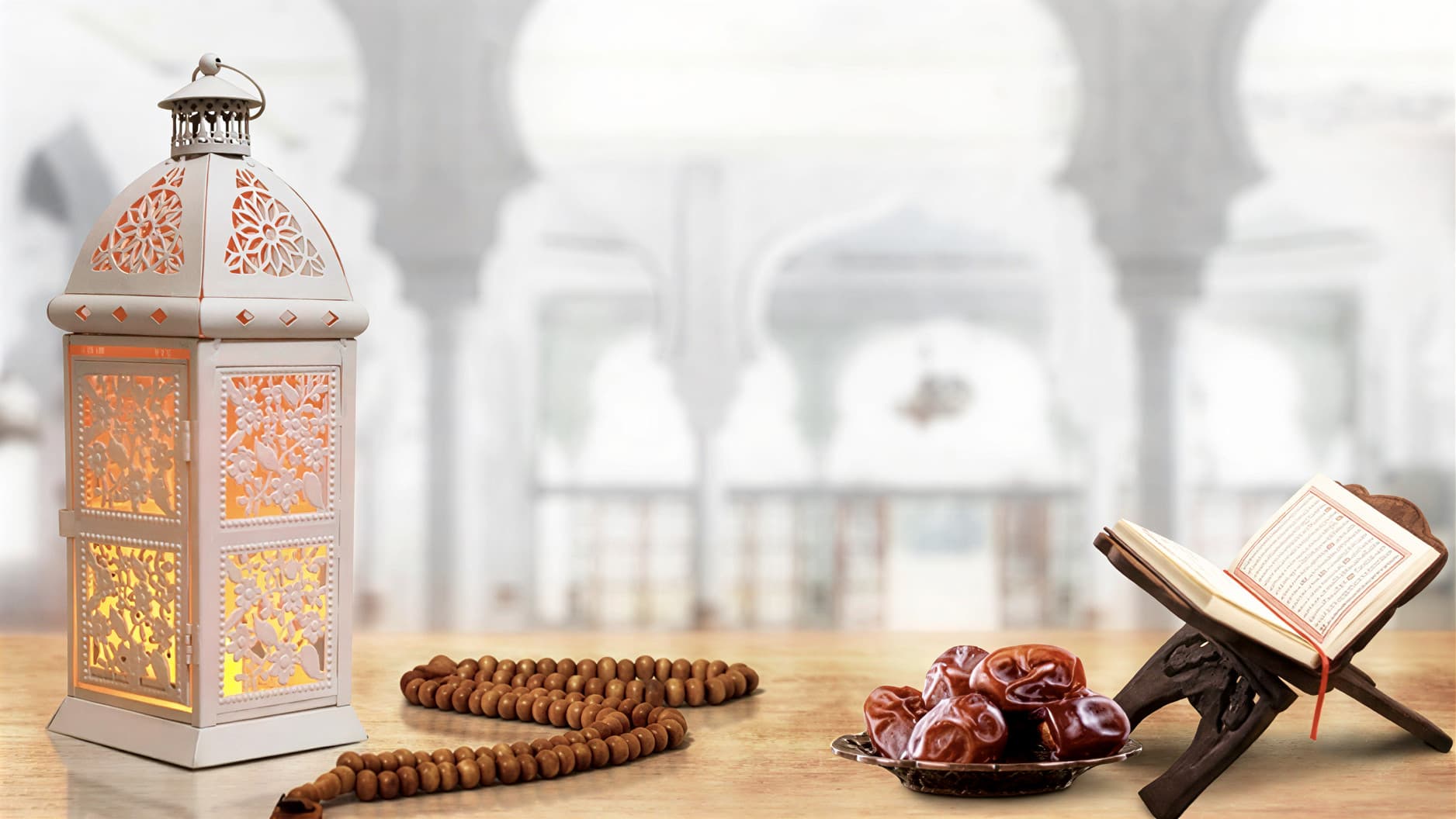 Quran, dates, and prayer beads